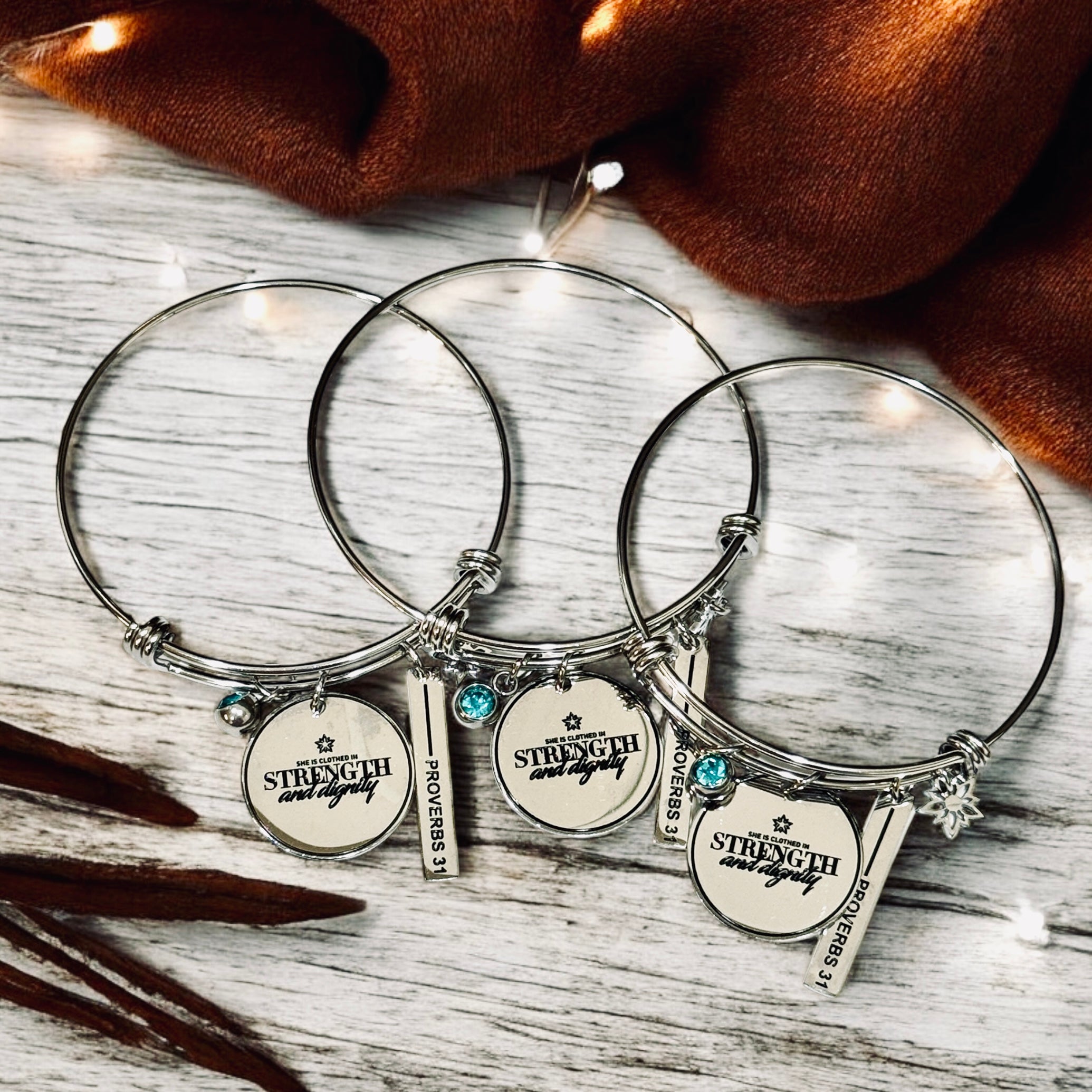 Strength + Dignity Charm Bracelet